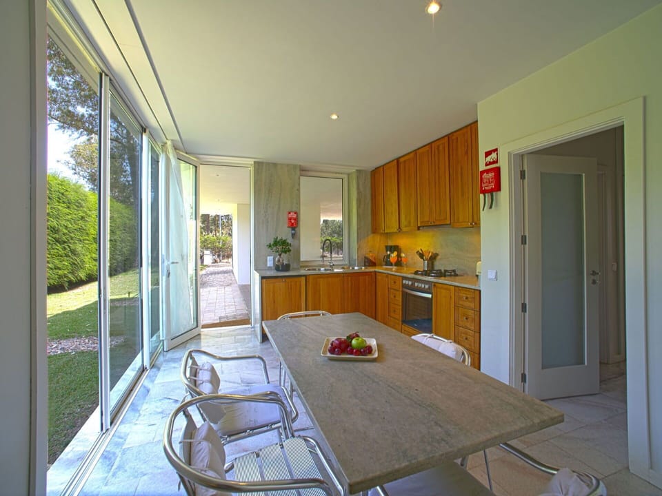 Cabinetry, Property, Furniture, Table, Plant, Countertop, Interior Design, Window, Kitchen, Wood
