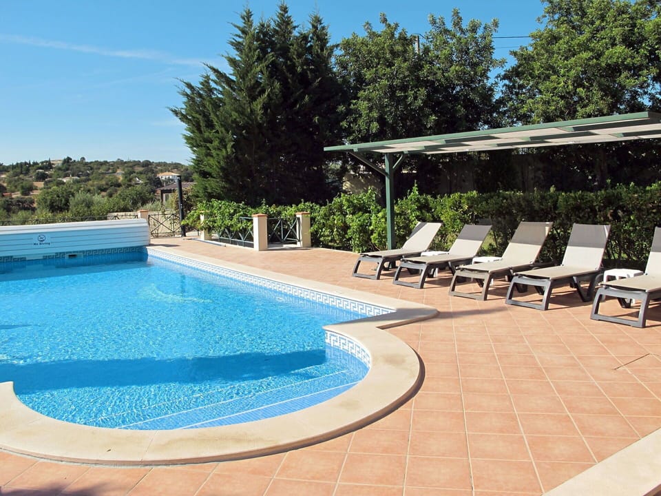 Water, Property, Sky, Swimming Pool, Plant, Azure, Tree, Shade, Outdoor Furniture, Chair