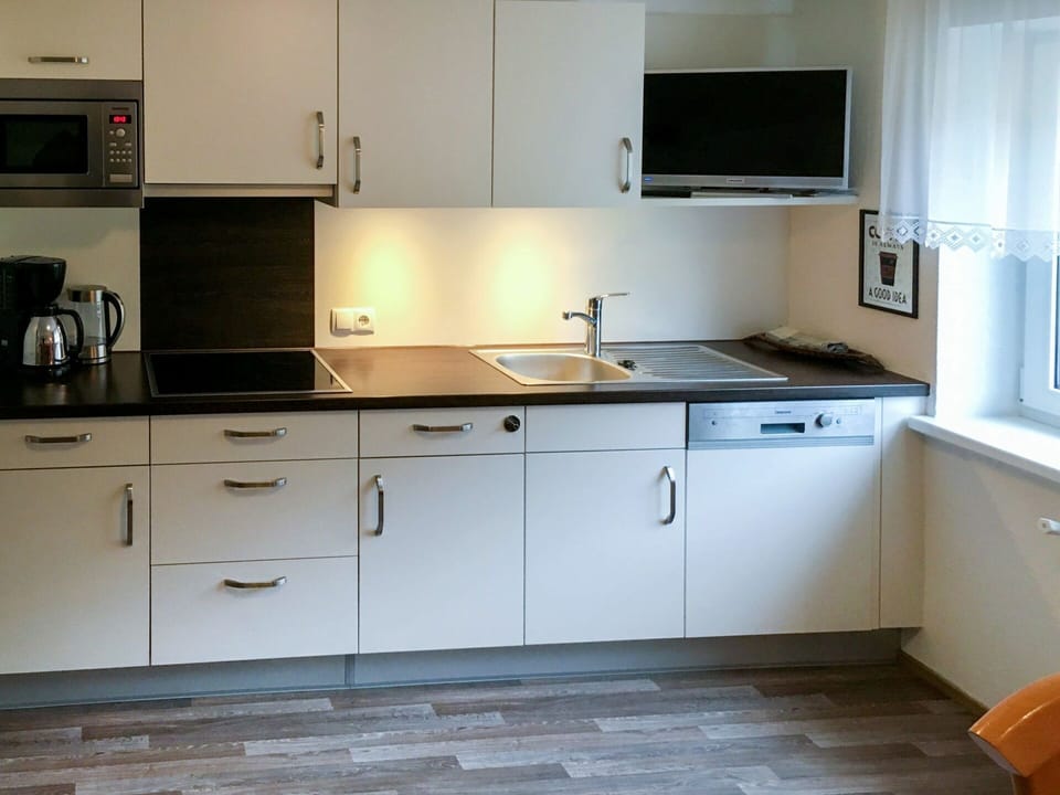Countertop, Cabinetry, Kitchen Sink, Furniture, Sink, Kitchen Appliance, Building, Kitchen, Kitchen Stove, Wood