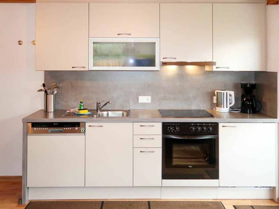 Tap, Kitchen Sink, Cabinetry, Sink, Countertop, Plumbing Fixture, Kitchen Stove, Building, Kitchen Appliance, Wood