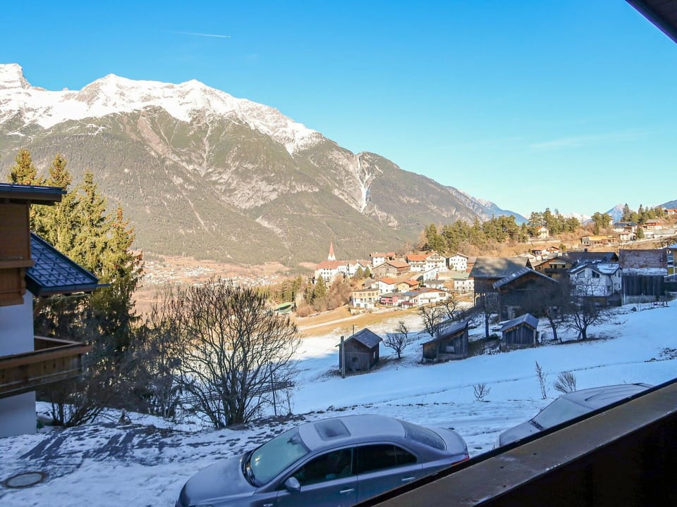 Sky, Snow, Car, Building, Mountain, Vehicle, Wheel, Cloud