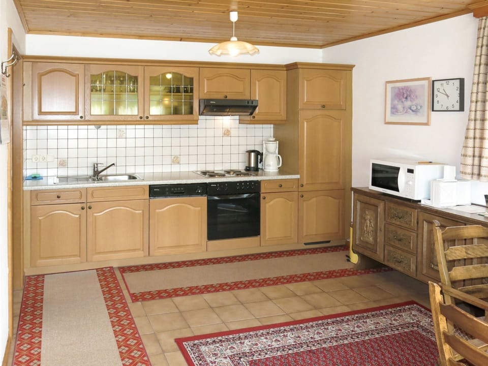 Room, Furniture, Cabinetry, Property, Kitchen, Countertop, Floor, Interior Design, Building, Tile