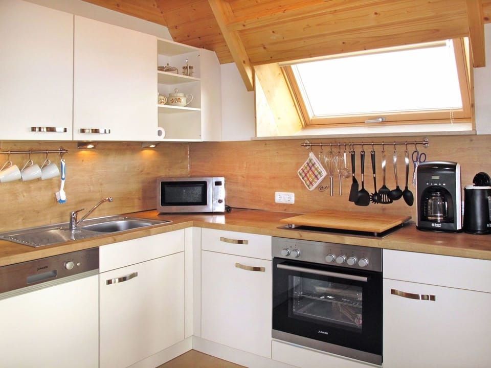 Countertop, Kitchen, Cabinetry, Room, Furniture, Property, Kitchen Stove, Interior Design, Building, House