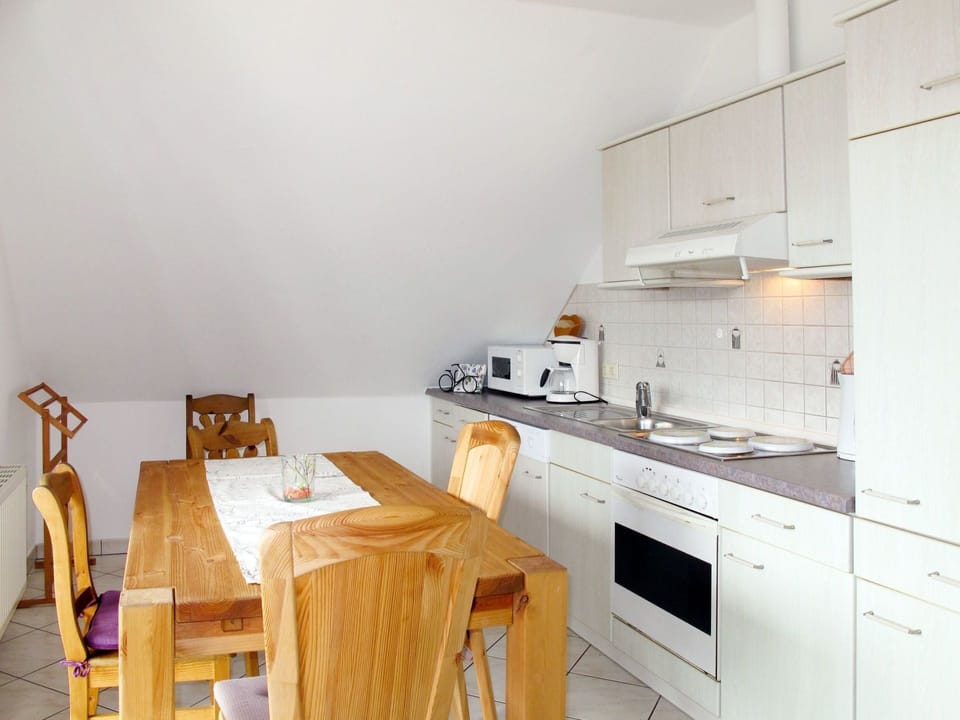 Room, Property, Kitchen, Furniture, Interior Design, House, Yellow, Building, Cabinetry, Floor