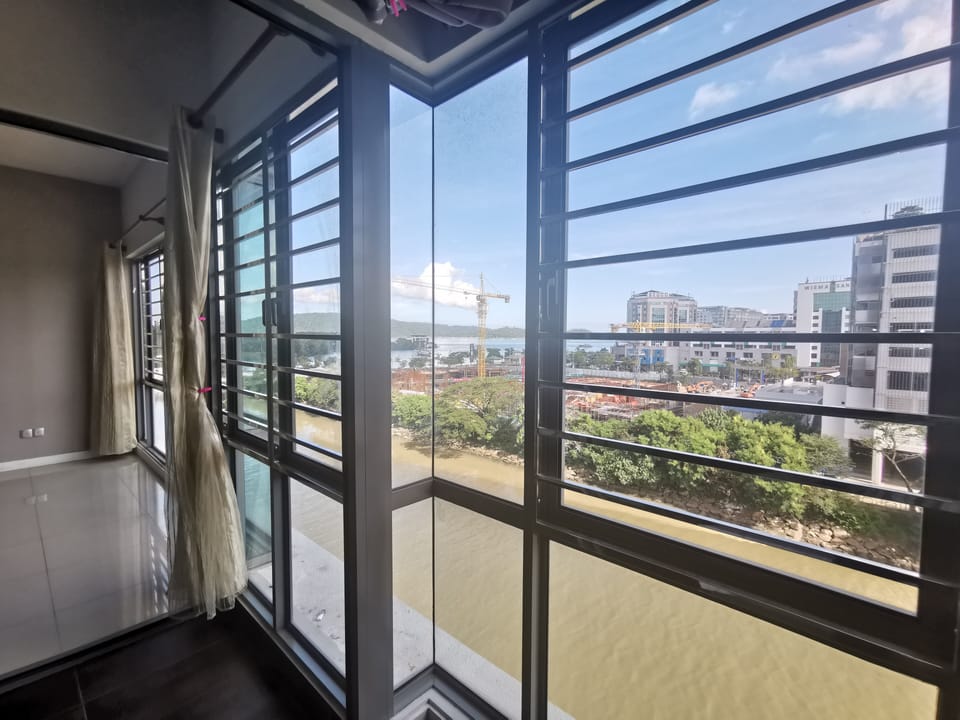 Living Room Facing River View & Slightly Seaview