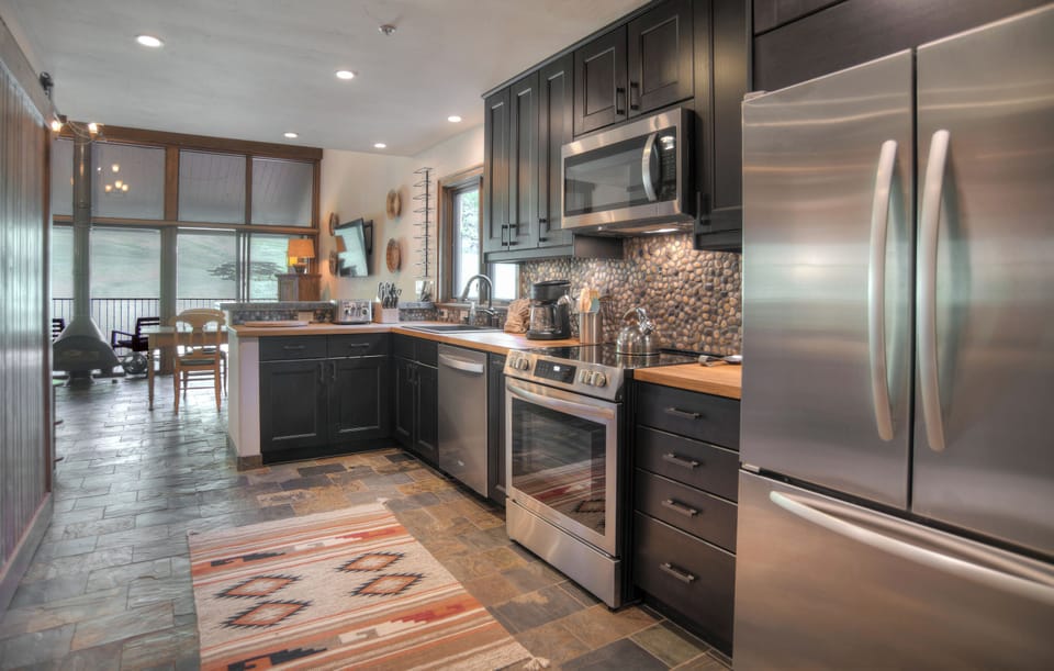 Whip up your favorite meals in this beautifully designed kitchen