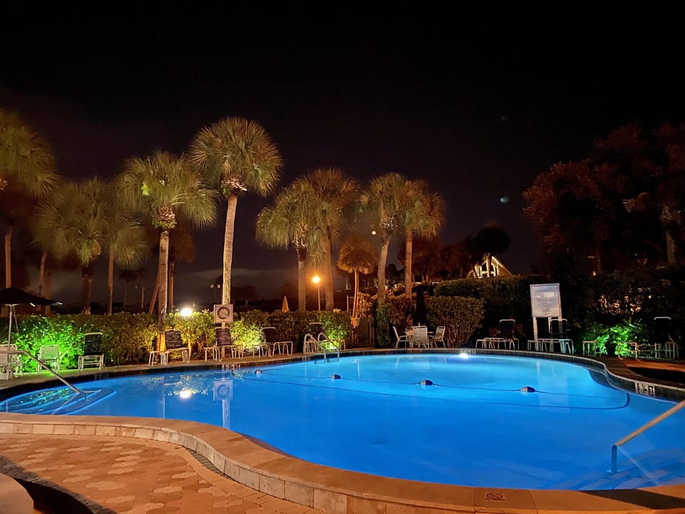LED lights illuminate the pool at night
