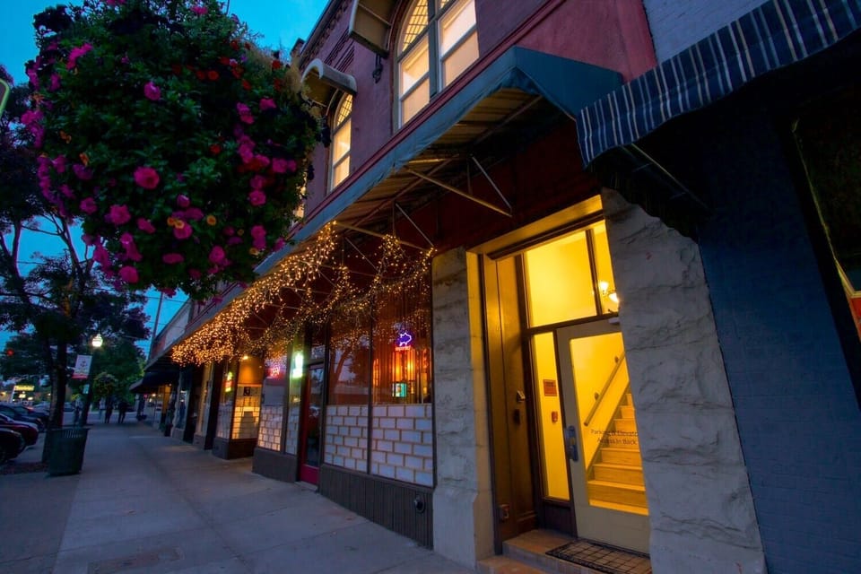 Main Street entrance. The private elevator and parking area are at the rear.