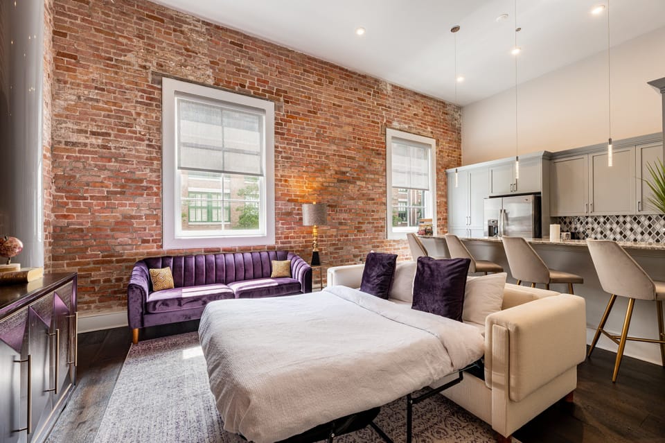 Bold & fun open-concept living and kitchen with plenty of comfortable seating. Enjoy a 65” Samsung Smart 4K TV with streaming and DIRECTV Entertainment. The sofa also converts to a queen-size sleeper sofa! Plus, lots of natural light!