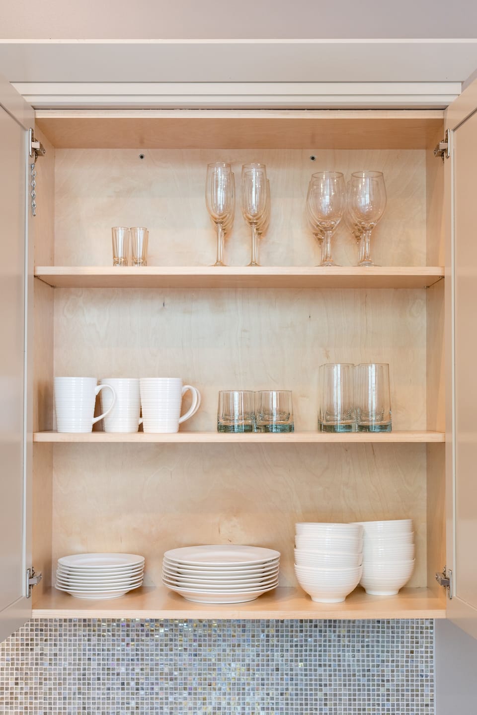 Cook and dine easily in the fully stocked kitchen, equipped with all stainless steel appliances, gas range, basic cookware, and a dining area for a comfortable meal at home. Entertain at the bar with seating for four.