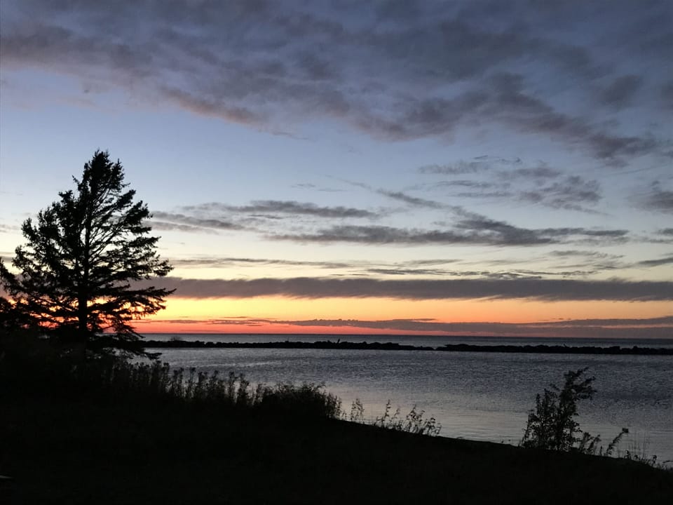 Sunset over black river Harbor in Lake Superior. Only about 20 minutes away.