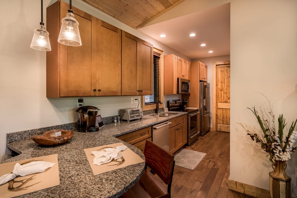 Kitchen with Attached Bar Table