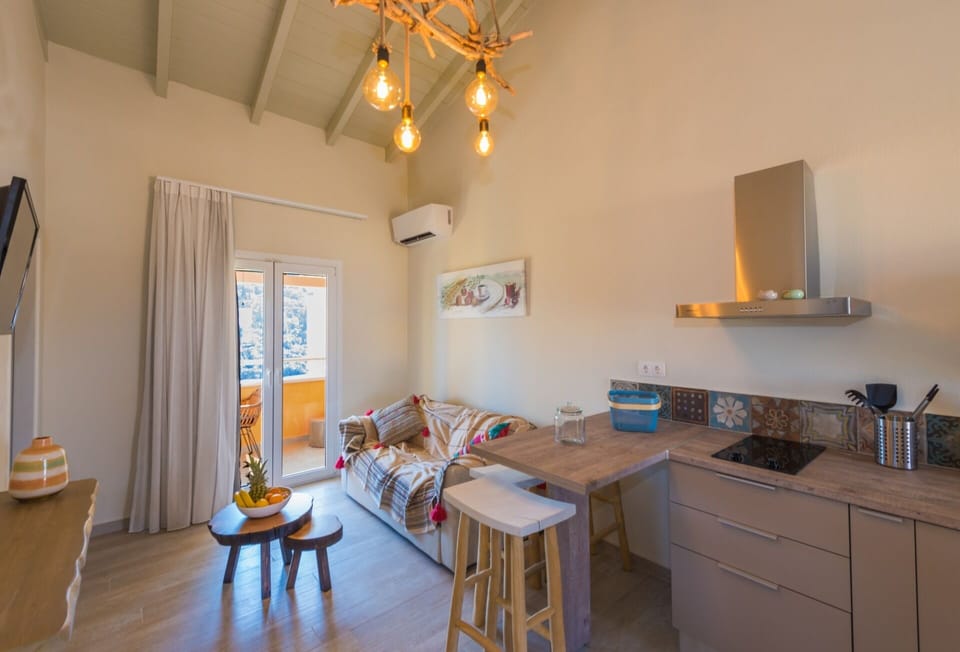 Living room with wooden ceilings and decorated with local arts and crafts