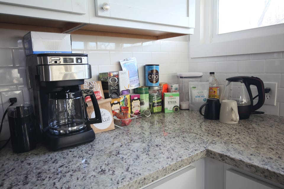 Help yourself to our fully stocked coffee and tea bar. Yes, we have decaf!