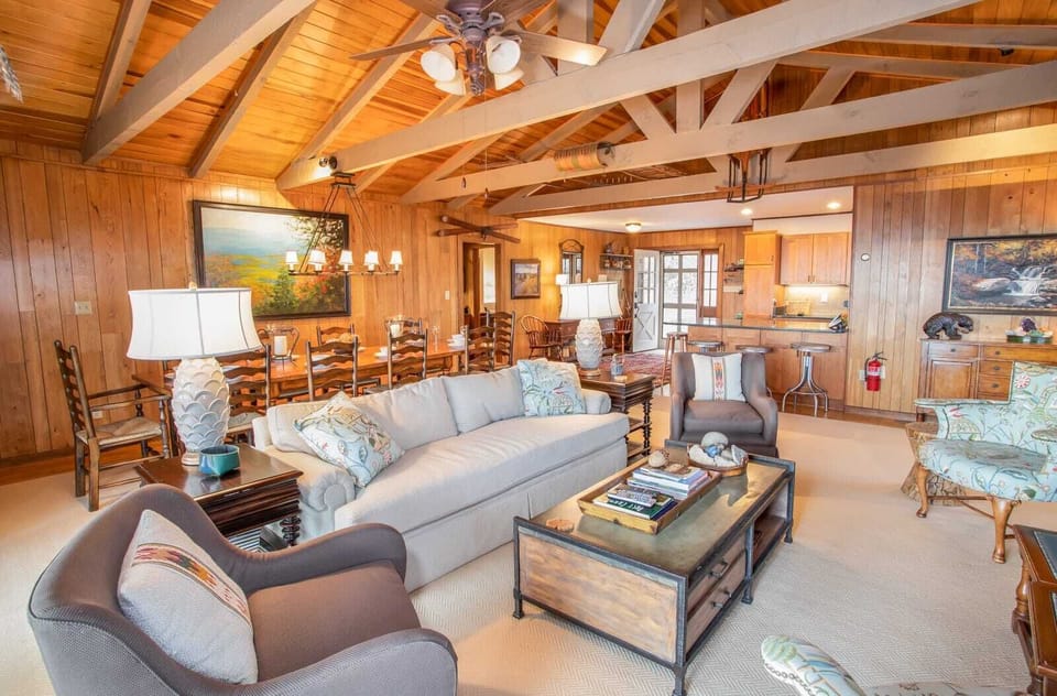 Open-Concept Living, Dining, Kitchen with Vaulted Ceilings and Exposed Beams