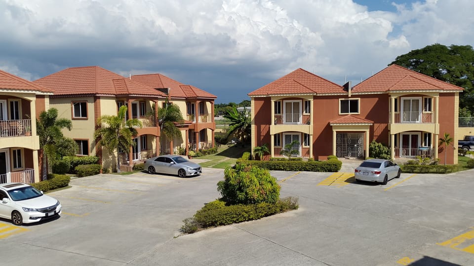 Balcony view of the beautifully landscaped complex.
