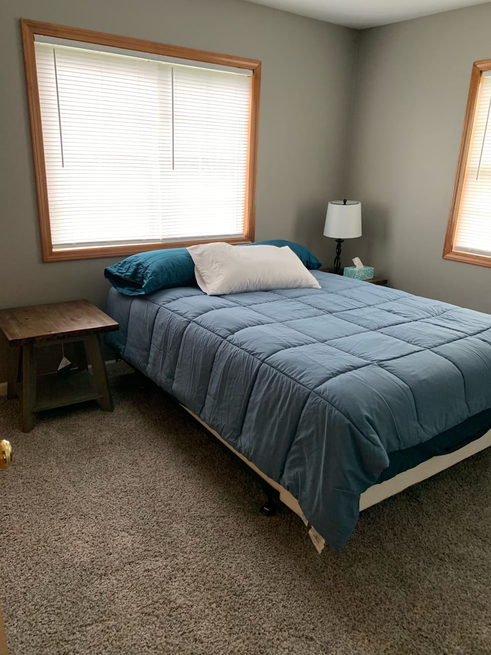 Queen bed -comfy and new!  Additional air conditioner in window. 