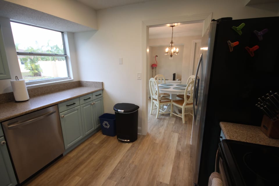 Kitchen with separate bin for ease of separating recycles