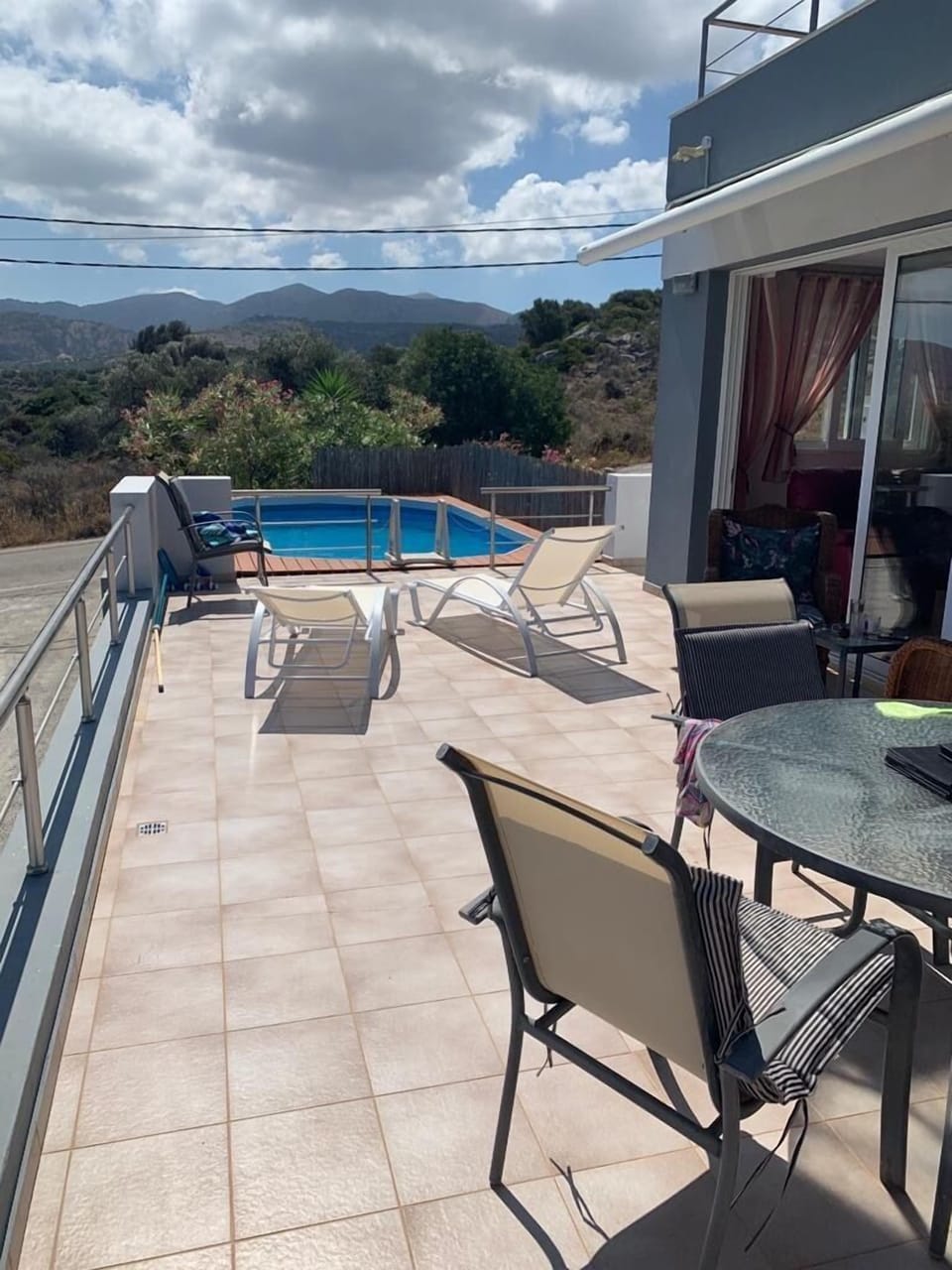 Large terrace with electric sun blind.