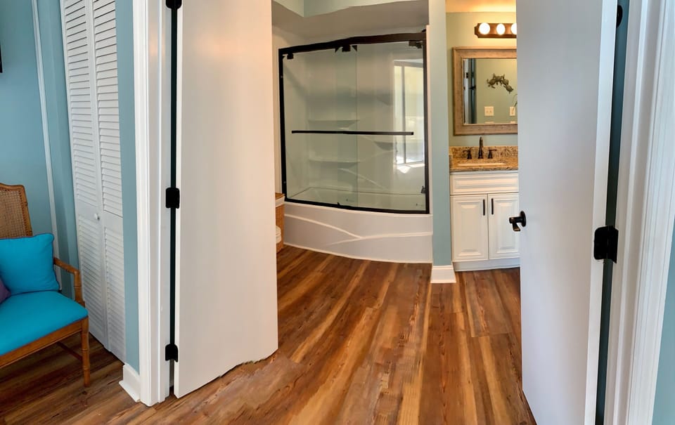 Renovated Spacious Primary Bathroom with new tub/shower & 2 New Sinks