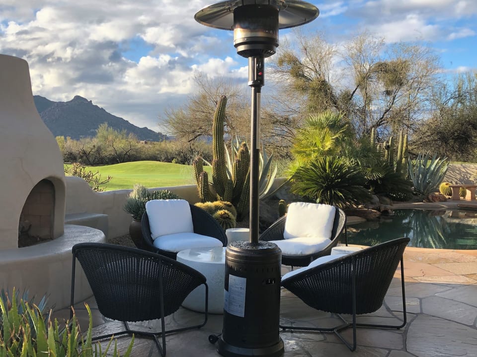 Private patio with gas log chimnea.