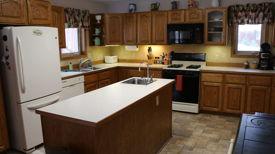 Lots of counterspace and two sinks make it easy to cook group meals.