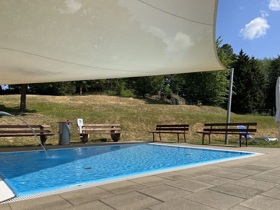 Water, Swimming Pool, Sky, Azure, Shade, Plant, Rectangle, Outdoor Furniture, Cloud, Leisure