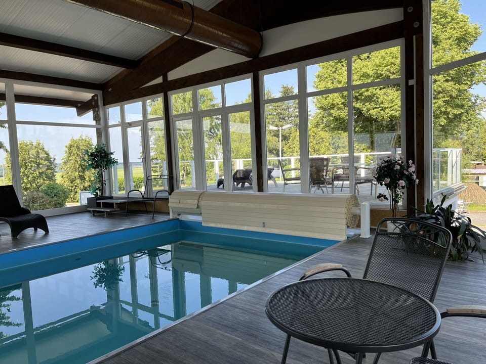 Property, Water, Table, Plant, Building, Interior Design, Swimming Pool, Architecture, Shade, Floor