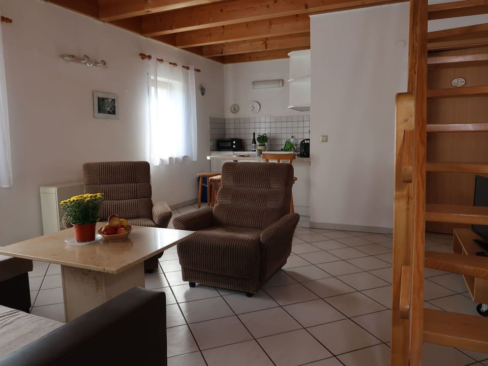 Furniture, Table, Plant, Houseplant, Couch, Comfort, Interior Design, Wood, Studio Couch, Flooring