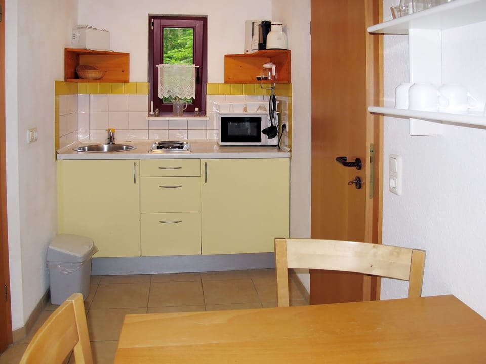 Room, Furniture, Property, Cabinetry, Kitchen, Floor, Interior Design, Building, Table, House