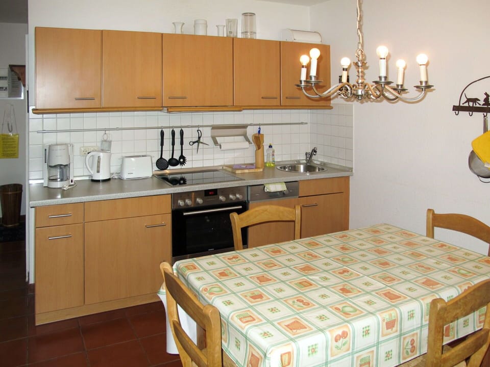Countertop, Room, Furniture, Kitchen, Cabinetry, Property, Floor, Interior Design, Building, Material Property