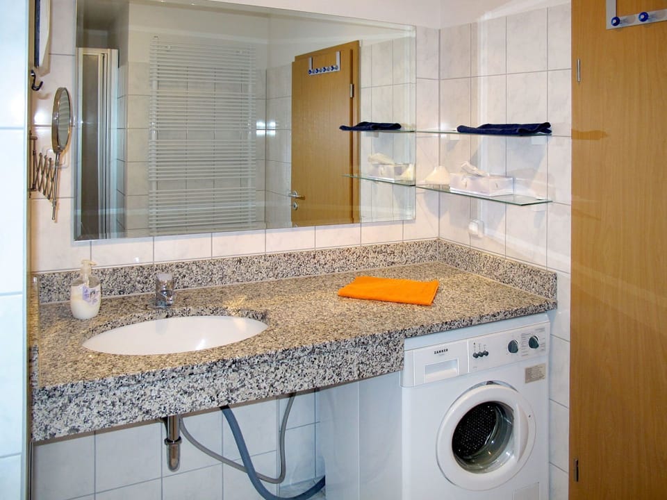 Room, Bathroom, Property, Tile, Laundry Room, Sink, Countertop, Interior Design, Furniture, Cabinetry