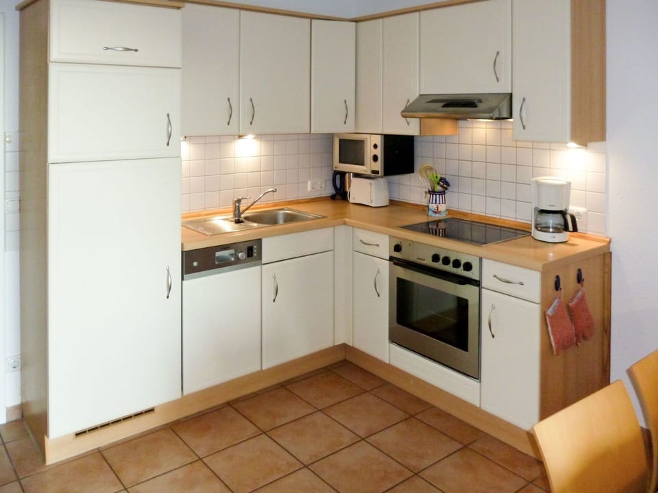Kitchen, Room, Cabinetry, Furniture, Property, Major Appliance, Countertop, Kitchen Stove, House, Home Appliance