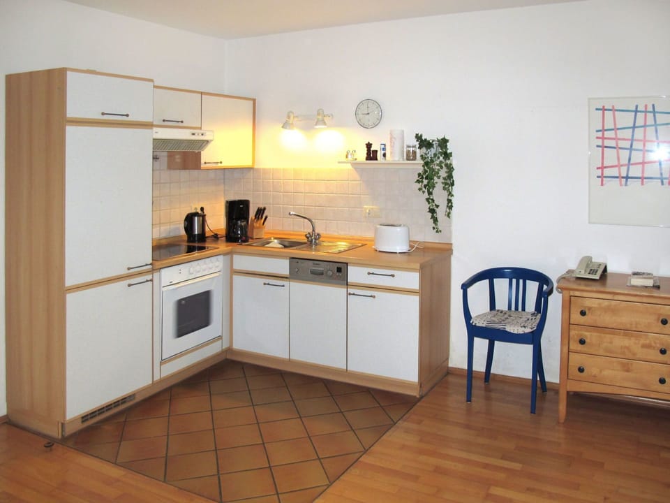 Room, Furniture, Kitchen, Property, Countertop, Cabinetry, Floor, Interior Design, Wood Flooring, Building