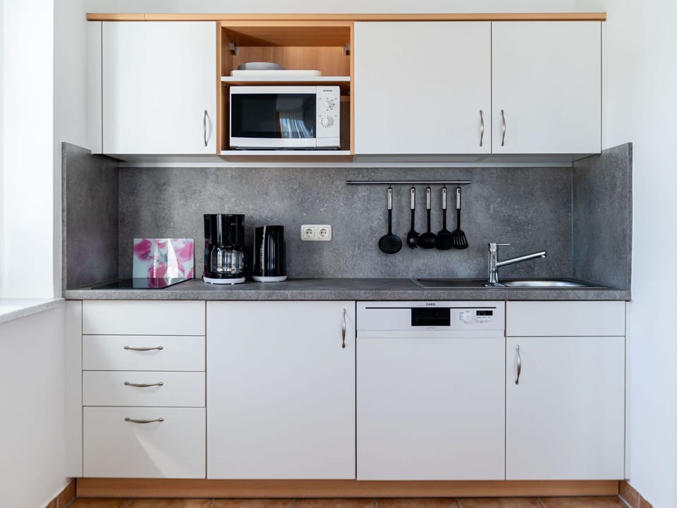 Cabinetry, Countertop, Kitchen Sink, Sink, Kitchen, Tap, Kitchen Stove, Kitchen Appliance, Wood, Interior Design