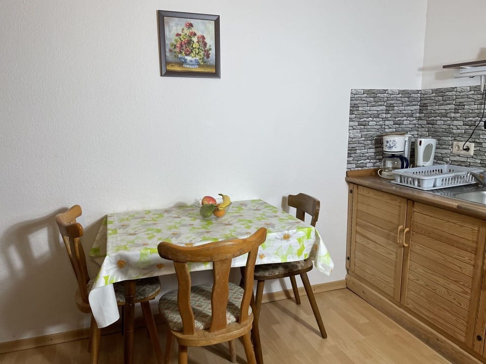 Table, Furniture, Property, Cabinetry, Chair, Wood, Interior Design, Picture Frame, Countertop, Paint