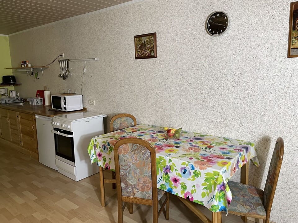 Furniture, Property, Table, Cabinetry, Countertop, Building, Interior Design, Wood, Picture Frame, Floor