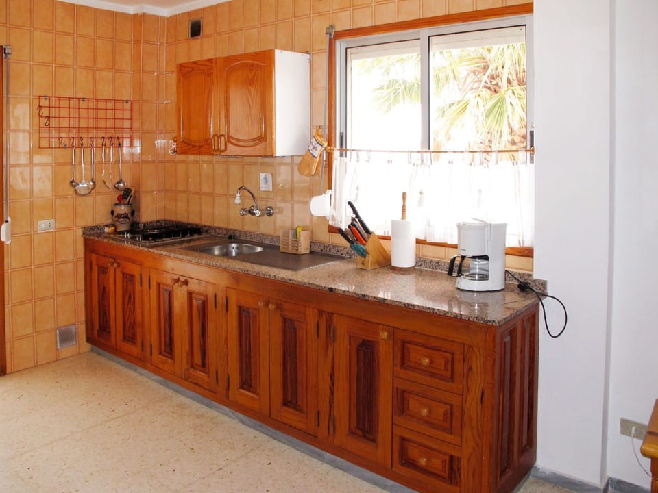 Cabinetry, Countertop, Property, Furniture, Kitchen Sink, Sink, Tap, Kitchen, Wood, Window