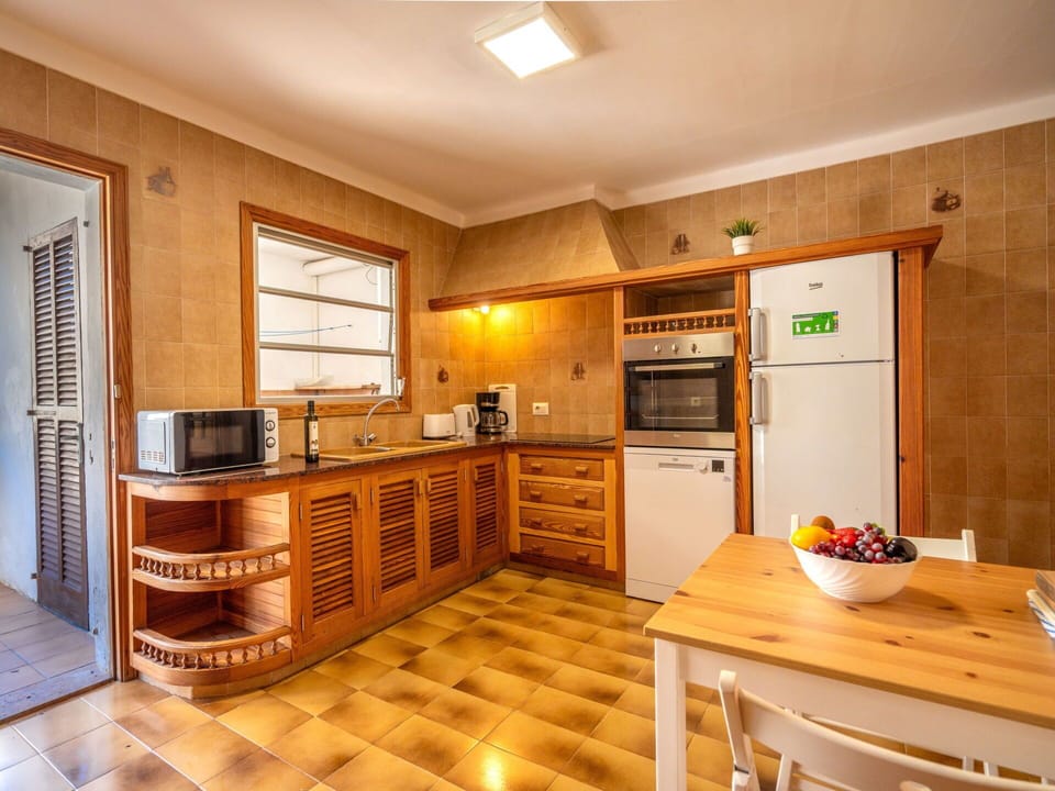 Cabinetry, Countertop, Furniture, Building, Kitchen, Drawer, Wood, Kitchen Stove, Home Appliance, Wood Stain