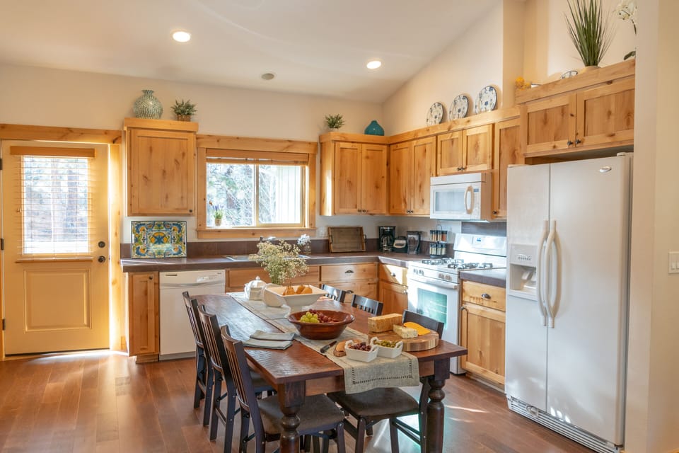 View from great room looking at dining area and kitchen. Tasteful and inviting.