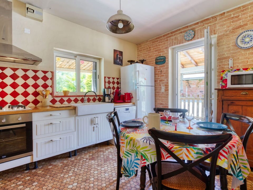 Cabinetry, Property, Furniture, Countertop, Wood, Table, Drawer, Lighting, Window, Kitchen