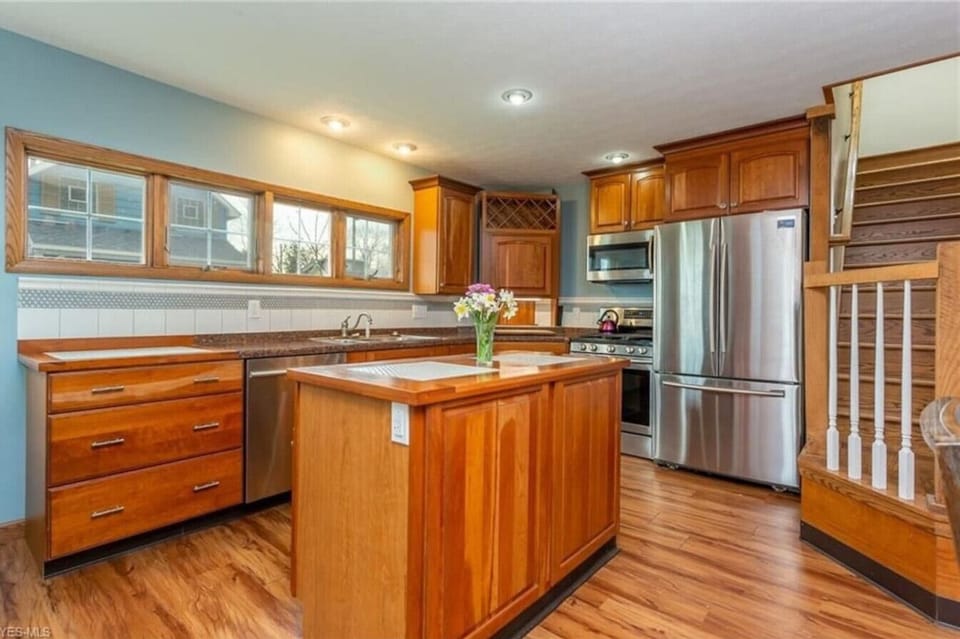 Fully stocked gourmet kitchen with gas stove, dishwasher and large refrigerator.  Also a microwave, blender, toaster, coffee pot and tea kettle are supplied.