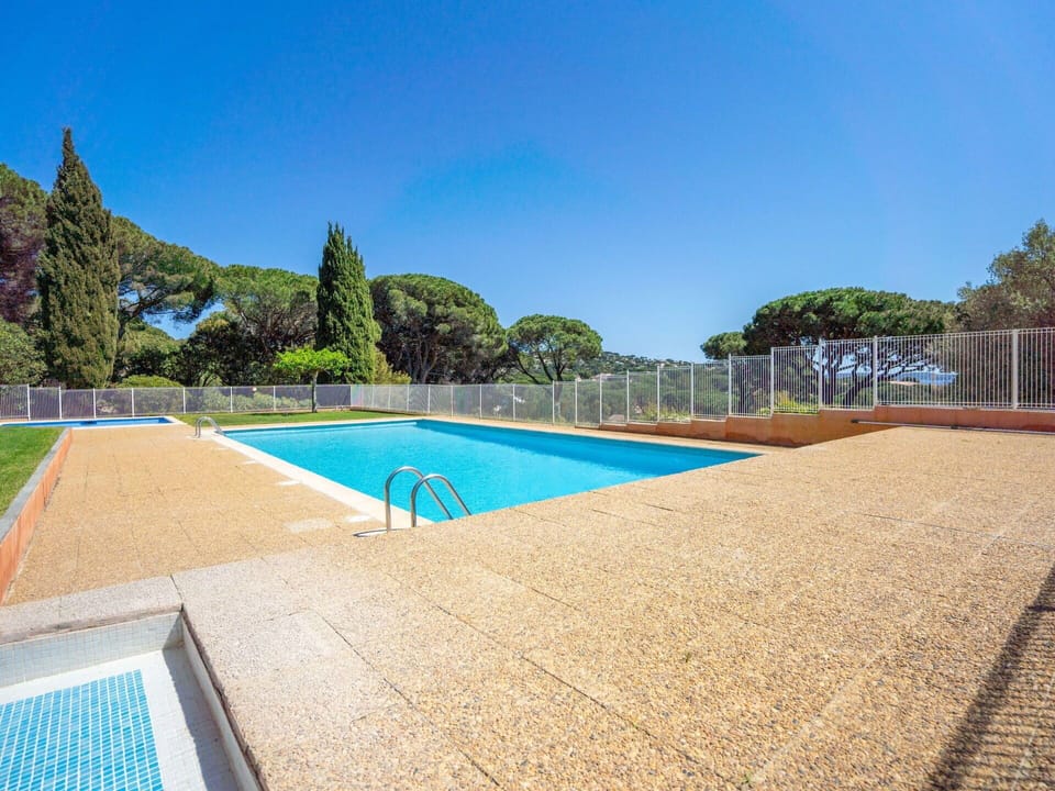 Sky, Swimming Pool, Building, Tree, Plant, Shade, Rectangle, Grass, Water, Landscape
