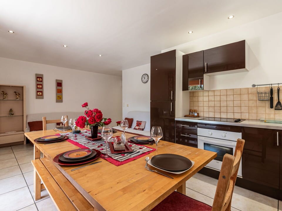 Cabinetry, Furniture, Table, Countertop, Wood, Kitchen, Lighting, Interior Design, Flooring, Floor