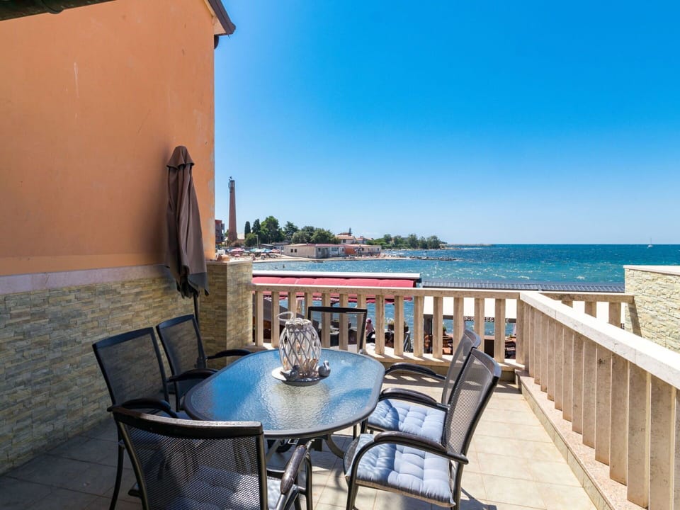 Sky, Table, Water, Property, Furniture, Building, Chair, Azure, Blue, Seaside Resort