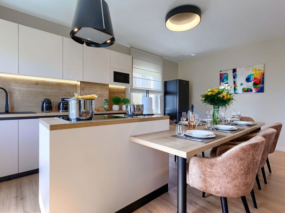 Property, Furniture, Countertop, Building, Cabinetry, Table, Kitchen Appliance, Interior Design, Home Appliance, Wood