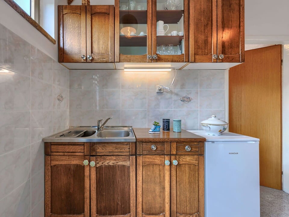 Brown, Cabinetry, Countertop, Furniture, Property, Building, Kitchen Sink, Sink, Wood, Kitchen