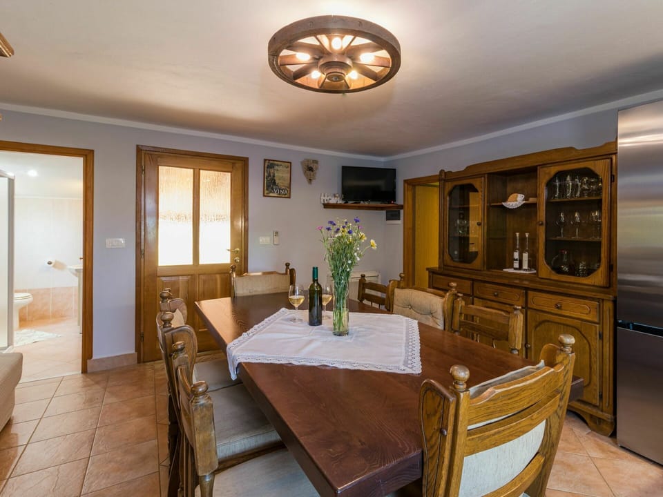 Furniture, Picture Frame, Cabinetry, Table, Building, Property, Plant, Houseplant, Chair, Wood