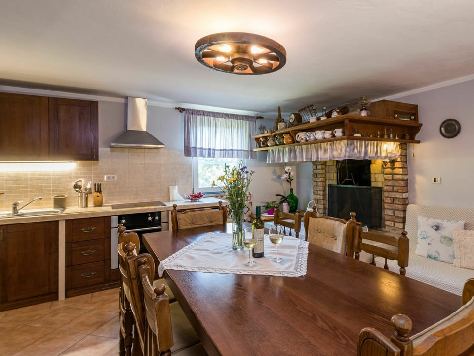 Table, Furniture, Property, Countertop, Cabinetry, Kitchen, Wood, Interior Design, Chair, Plant