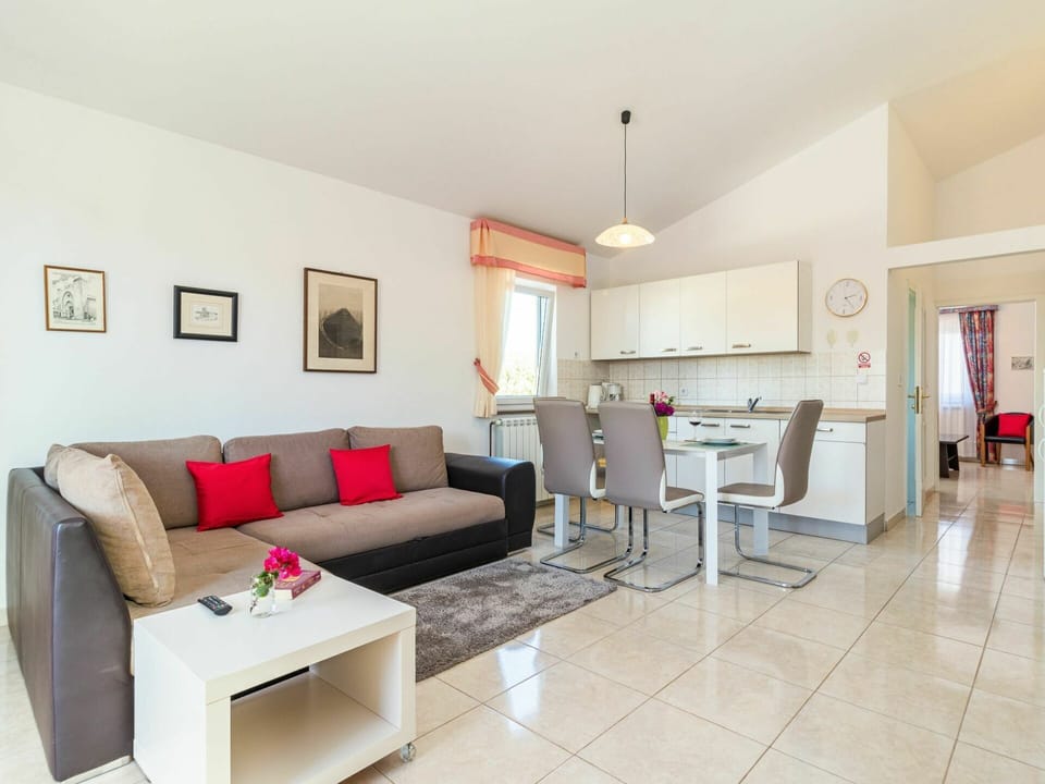 Couch, Furniture, Table, Property, Comfort, Picture Frame, Studio Couch, Building, Lighting, Interior Design